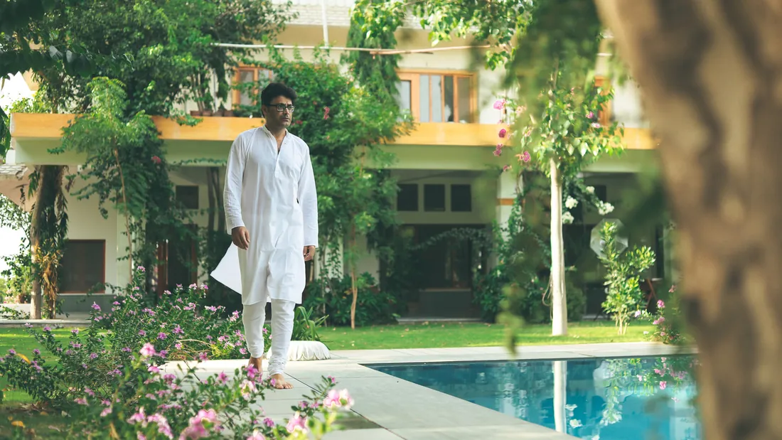 Udai walking by the pool
