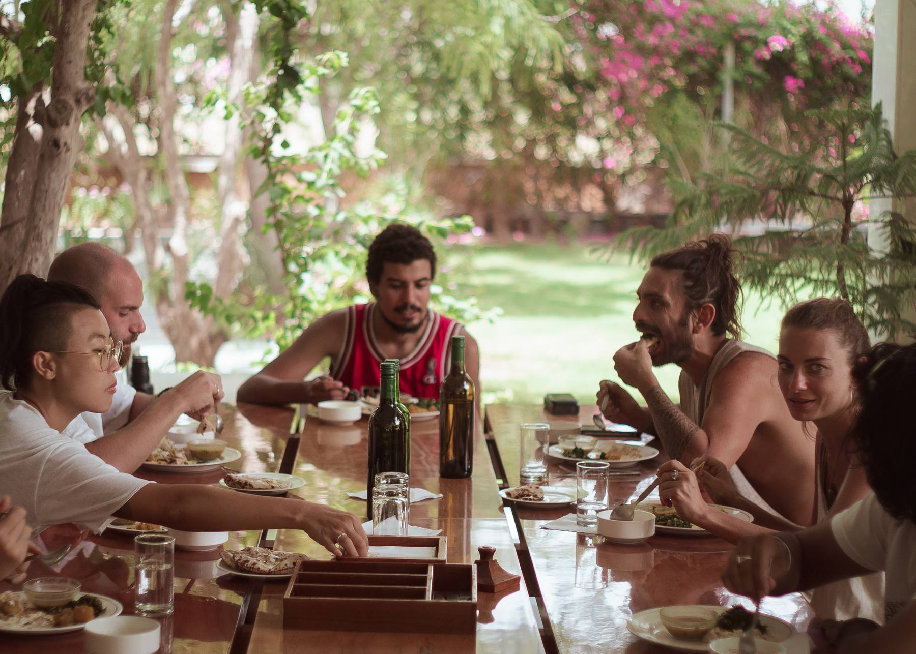 A warm communal dining moment at the farm