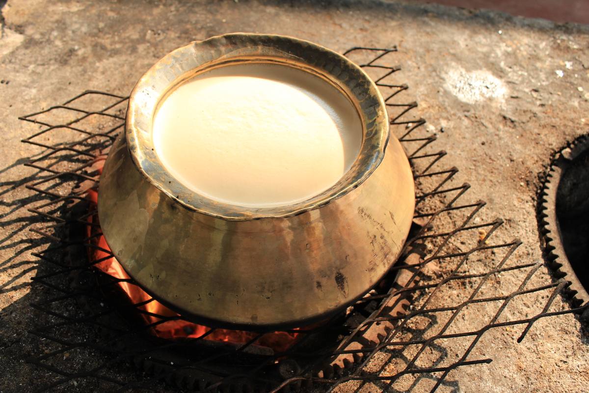 A pot cooking on the open fire