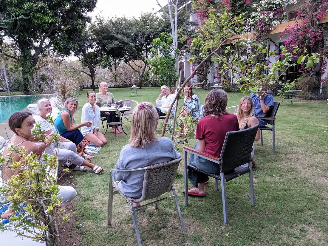 Guests in the garden at PushkarOrganic — circle on lawn