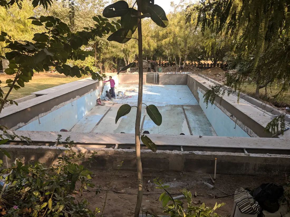 The finished, empty pool shell in evening light