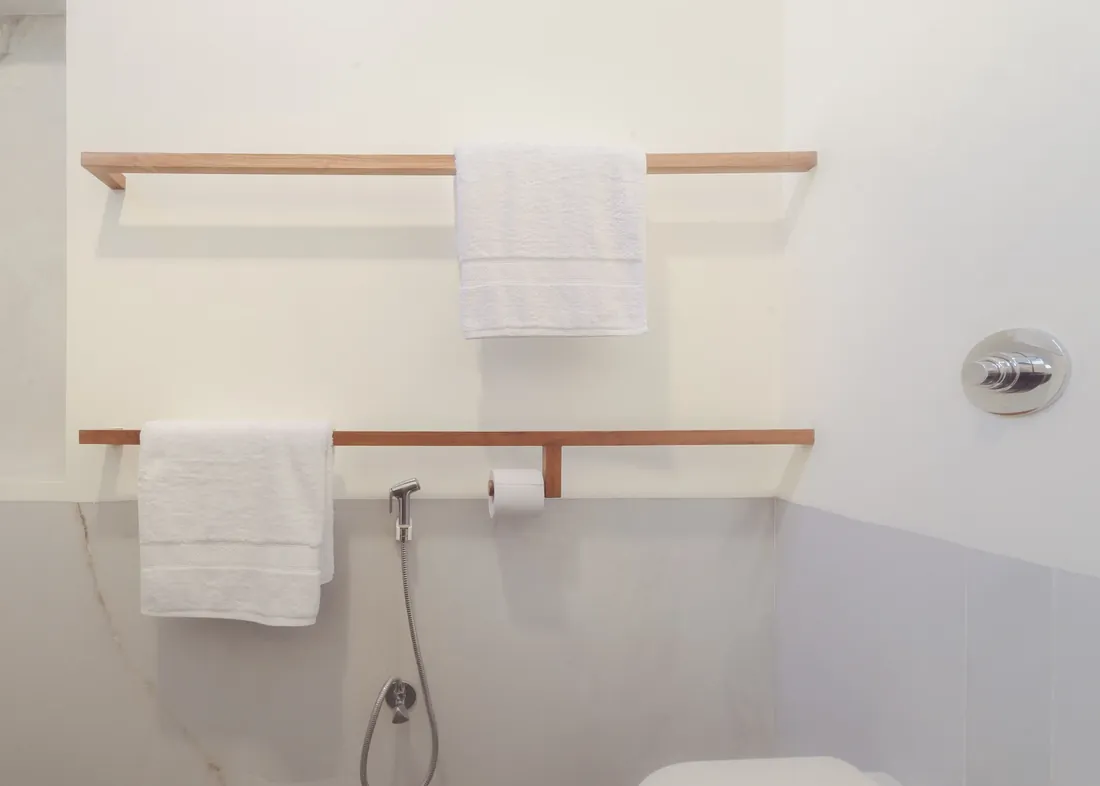 Fresh towels and shower controls in the Standard bathroom