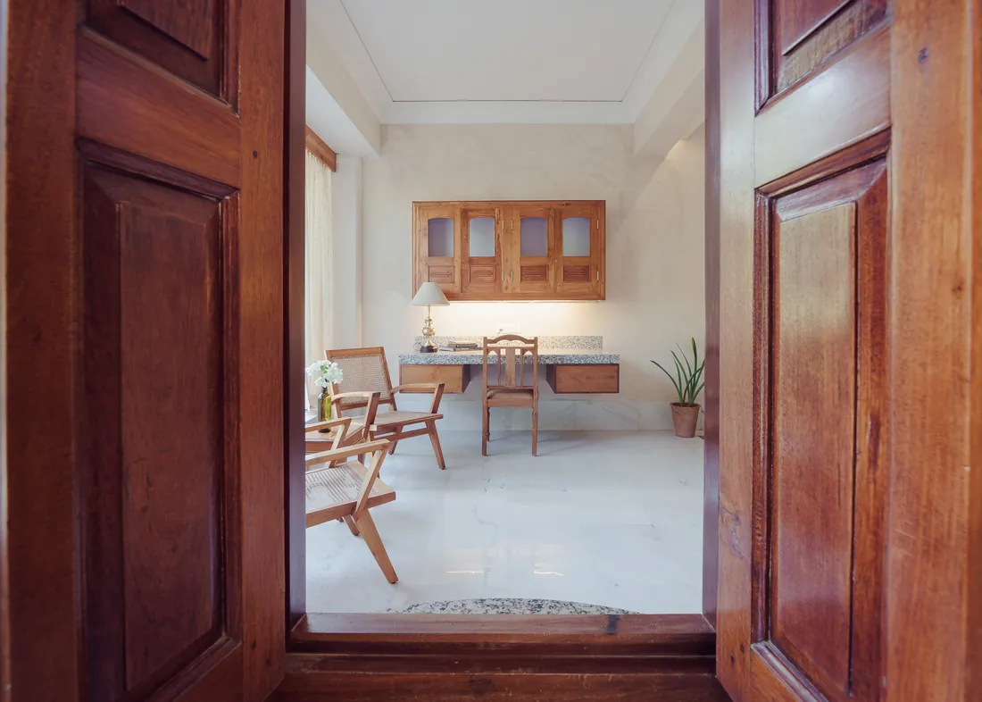 The Suite work area seen through its wooden doors