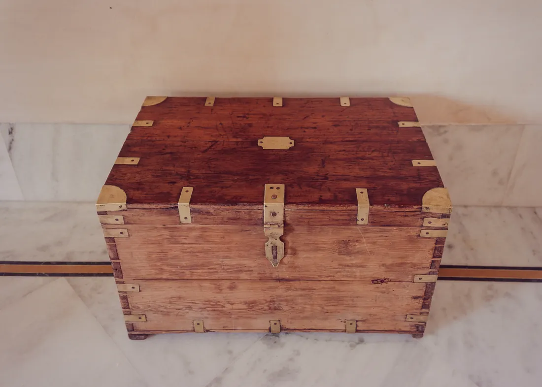 An antique wooden trunk in the Suite