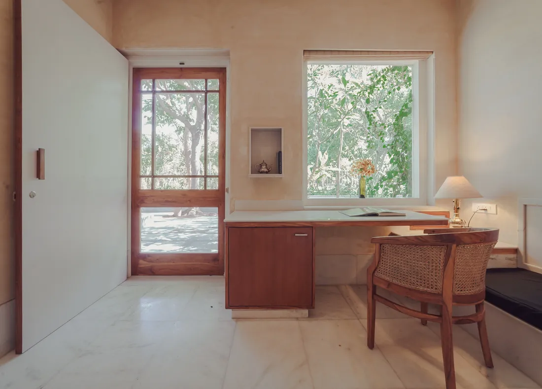 Desk and garden through the window