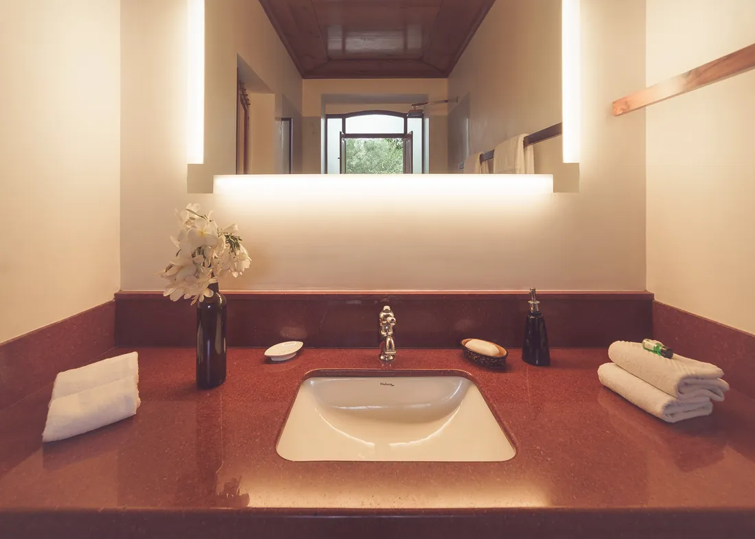 Bathroom: sink and mirror